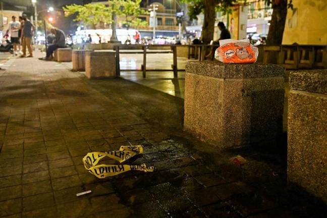 Police tape is pictured where a Cambodian MP was reportedly shot, in Bangkok on January 7, 2025. AFPpix