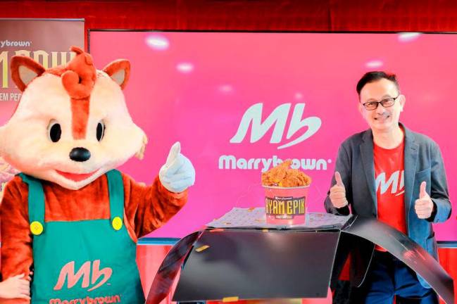 Chan and Marrybrown mascot ‘Brownnie’ launching Ayam Epik.