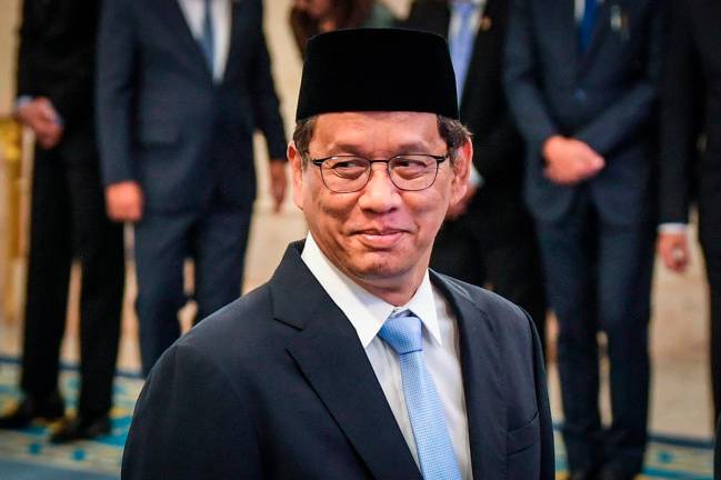 Indonesia’s newly appointed Finance Minister Purbaya Yudhi Sadewa attends his swearing-in ceremony at the Presidential Palace in Jakarta on September 8, 2025. - AFP