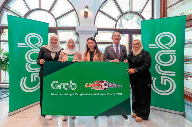 From left to right: Dato’ Suraya Yaacob, FAM Executive Committee Member &amp; Chairman of the Women’s Football Committee, Zafira Azahar, Head of Driver Operations, Grab Malaysia, YB Hannah Yeoh, Minister of Youth and Sports Malaysia, Datuk Mohd Joehari Mohd Ayub, President of Football Association of Malaysia (FAM) &amp; Dr. Siti Faidul Maisarah Abdullah, Executive Committee Member for the Women's Football Association of Malaysia (FAM).