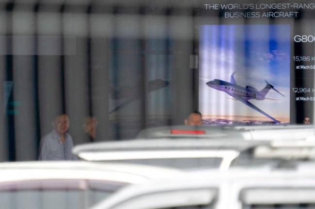 Thailand’s former Prime Minister Thaksin Shinawatra leaves after exiting a private jet terminal at Bangkok’s Don Mueang International Airport, after he flew out of the country on September 4, for what he claimed was a medical check-up in Dubai ahead of a key court case, at Bangkok, Thailand, September 8, 2025. - REUTERS