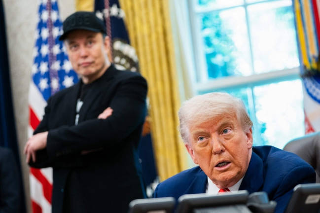 Elon Musk (left) and US President Donald Trump (right). - AFPpix