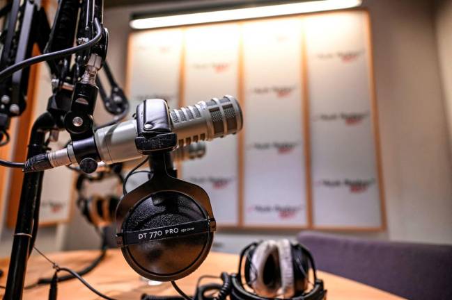 A photo shows a microphone and a headset in a studio of Istanbul-based Acik Radyo after the radio station was suspended from broadcasting by the authorities, in Istanbul on October 16, 2024. - AFP