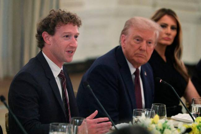 Meta CEO Mark Zuckerberg speaks as U.S. President Donald Trump and first lady Melania Trump listen during a dinner at the State Dining Room of the White House on September 4, 2025 in Washington, DC. - Getty Images via AFP