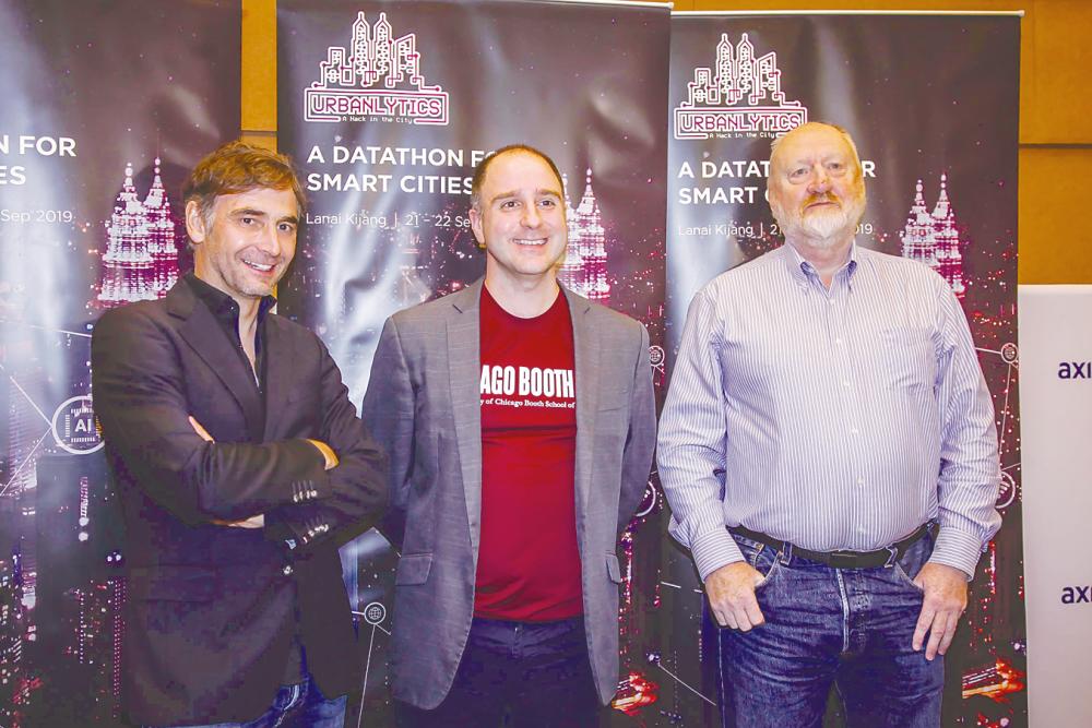 From left: Asia School of Business Assistant Professor of Marketing Willem Smit, Recio and Morrisey at the media briefing yesterday. – adib rawi yahya/theSun