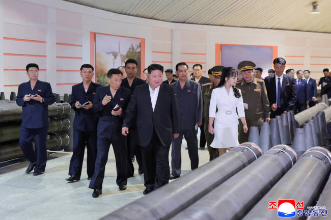 North Korean leader Kim Jong Un inspects military factories, as he urges ramp-up in shell production to meet modern warfare demands, at an unknown location in North Korea, June 13, 2025. - KCNA via REUTERS