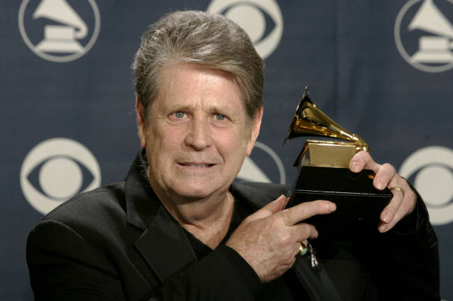 Former Beach Boy Brian Wilson holds his award backstage at the 47th annual Grammy Awards at the Staples Center in Los Angeles, U.S., February 13, 2005. - REUTERSpix