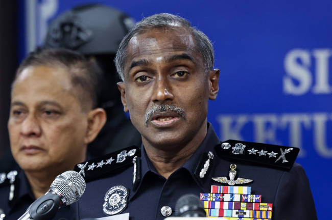 Johor Police Chief Datuk M Kumar (right) speaks at a press conference regarding a special operation involving a drug seizure worth over RM6.87 million at the Johor Contingent Police Headquarters (IPK) today. - BERNAMA