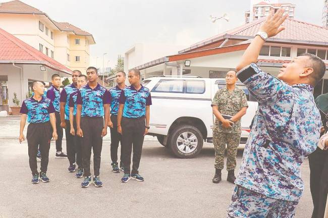 Attendance for the second and third series of the National Service Training Programme 3.0 this year would be mandatory for selected 18-year-olds. - ADIB RAWI YAHYA /THESUN