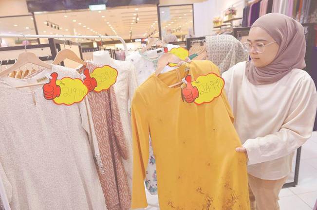 Nur Asyikin said on regular days, a baju kurung may cost about RM120 but during Ramadan and closer to Hari Raya, prices could increase by 10% to 20%. - MASRY CHE ANI/THESUN