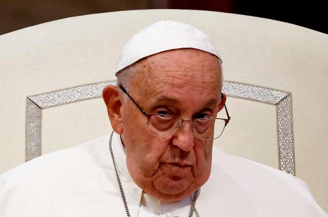 Pope Francis looks on as he holds general prayers for peace at the Papal Basilica of Saint Mary Major (Santa Maria Maggiore) on the eve of the anniversary of the October 7 attack on Israel, amid the Israel-Hamas conflict, in Rome, Italy, October 6, 2024. - REUTERS/Yara Nardi