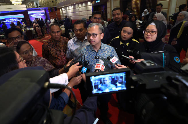 Communications Minister Datuk Fahmi Fadzil at a press conference after the 2025 Malaysian Media Clubs Coalition Dinner, held in conjunction with GKMM’s 2nd Annual General Meeting and National Journalists’ Day (HAWANA) 2025 celebrations, which will take place tomorrow at the Kuala Lumpur World Trade Centre (WTCKL). - BERNAMApix