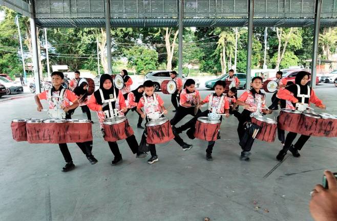 The Sekolah Kebangsaan (SK) Pendang Drumline team underwent a training session at Pendang Square today. - Bernama pic