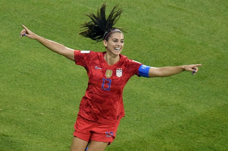US forward Alex Morgan, seen here celebrating her World Cup semi-final goal against England, is out for the rest of the 2019 season. — AFP