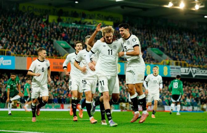 Germany’s Nick Woltemade celebrates scoring their first goal with Aleksandar Pavlovic. REUTERS/Clodagh Kilcoyne TPX IMAGES OF THE DAY