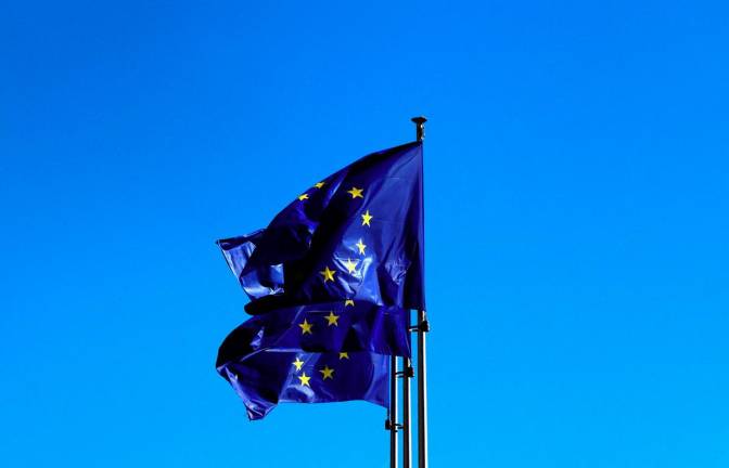 European Union flags flutter outside the EU Commission headquarters in Brussels, Belgium March 18, 2025. - REUTERSpix
