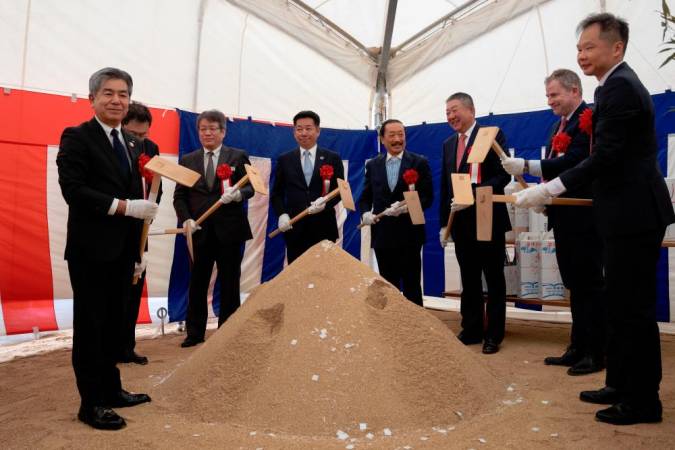 Tan (fourth from right) at the groundbreaking ceremony today