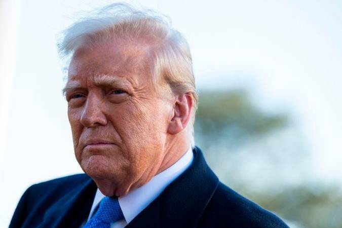 US President Donald Trump speaks to the press as he departs the White House from the South Lawn in Washington, DC, on March 21, 2025. AFPpix