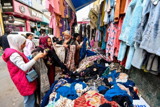 For representational purposes -Tunisians shop at the Sidi Boumendil souk (market) in Tunis on March 21, 2025, AFPpix