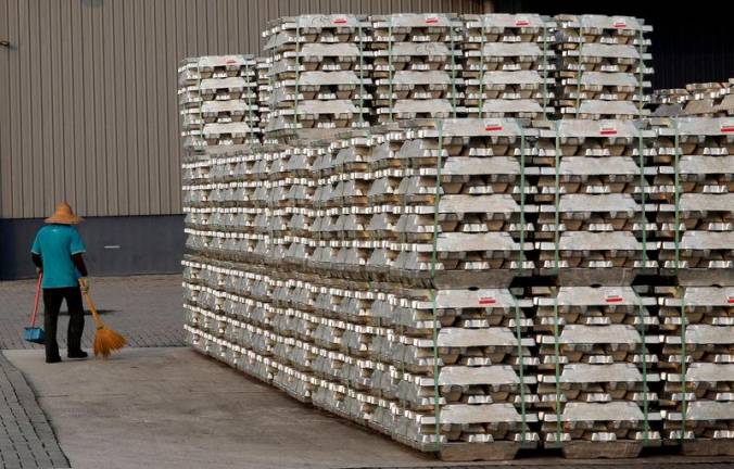 For representational purpose - Aluminium ingots are seen outside a warehouse that stores London Metal Exchange stocks in Port Klang Free Zone, outside Kuala Lumpur, March 23, 2015. REUTERSpix