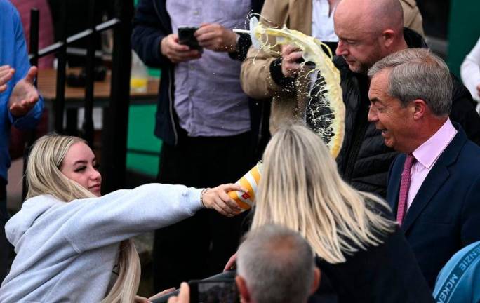 Victoria Thomas Bowen, 25, pleaded guilty to assault by beating after throwing a milkshake at the hard-right Reform UK leader Nigel Farage as he left a pub in the seaside resort of Clacton-on-Sea during the general election campaign. AFPPIX