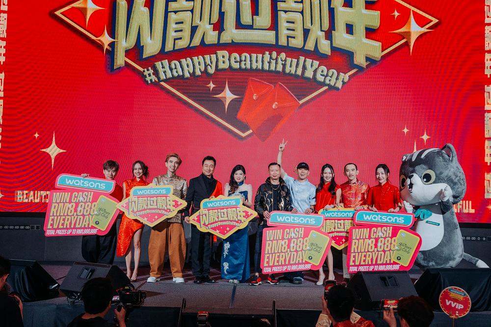 Loh (fifth from left), Hoh (fifth from right) and celebrities at the launch of Watsons’s #HappyBeautifulYear 2025 Sim Leng Gor Leng Nin.