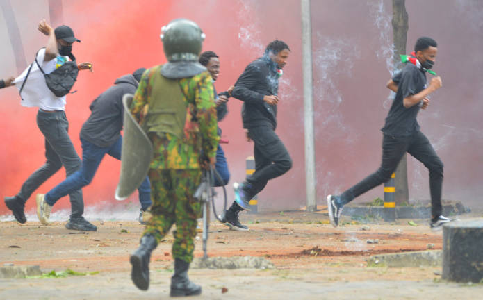 A riot police officer disperses protestors during a demonstration held to mark the first anniversary of the deadly 2024 anti-government protests that drew widespread condemnation over the use of force by security agencies, in Nairobi, Kenya June 25, 2025. - REUTERS