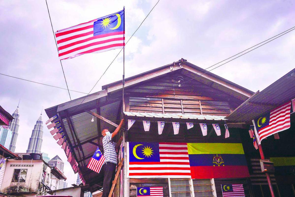 The Jalur Gemilang has always been part of our lives. But now, it feels like the flag has turned into a test. – ADIB RAWI YAHYA/ THESUN