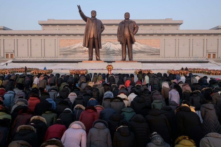 Thousands of North Koreans braved bitterly cold weather to pay tribute to late leader Kim Jong Il on his birthday. — AFP