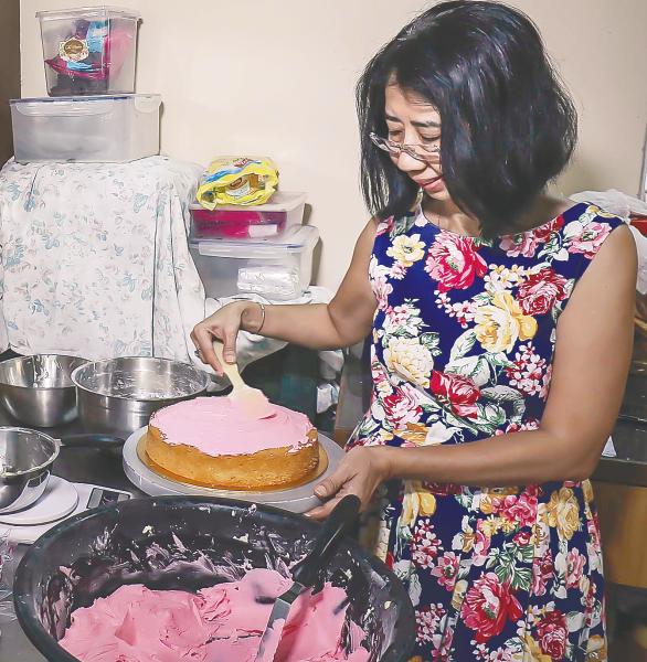 Nora at her Seremban-based ‘makeshift bakery’. – Sunpix by Adib Raqi Yahya