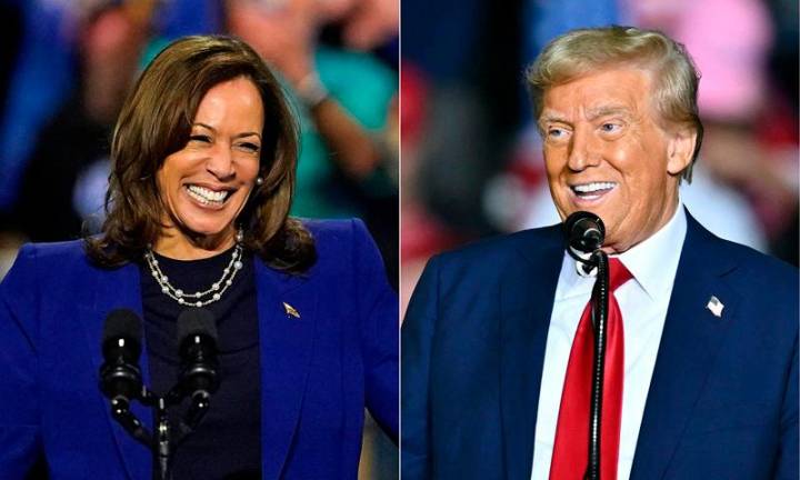 (COMBO) This combination of pictures created on November 01, 2024 showsUS Vice President and Democratic presidential candidate Kamala Harris (L) speaks during a campaign rally in Reno, Nevada, on October 31, 2024, and former US President and Republican presidential candidate Donald Trump (R) speaks at a campaign rally at the PPL Center in Allentown, Pennsylvania, on October 29, 2024. - LOREN ELLIOTT and ANGELA WEISS / AFP)