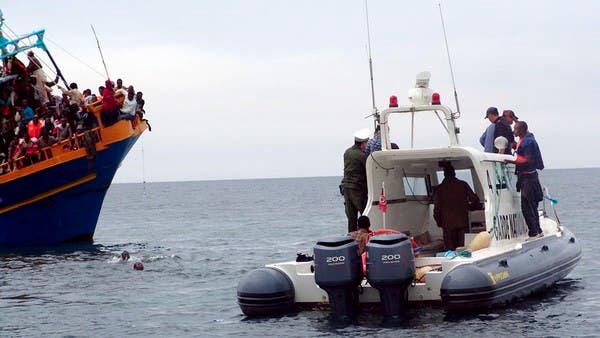 A file photo shows Tunisian coastguards rescue African migrants stranded on a boat coming from Libya, near Sfax, Tunisia. — AFP