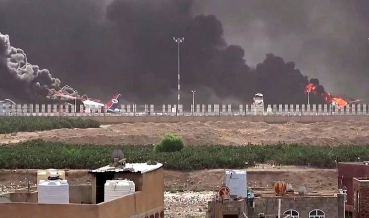 A handout picture released by the Huthi-affiliated branch of the Yemeni News Agency SABA on May 6, 2025, shows smoke billowing at Sanaa international airport after Israel's military warplanes struck Yemen's rebel-held capital Sanaa. Israel's military said its warplanes struck Yemen's rebel-held capital Sanaa on May 6, fully disabling the airport, the latest retaliation for a missile attack by the Iran-backed Huthis on Israel's main airport. - AFP PHOTO / HO / SABA