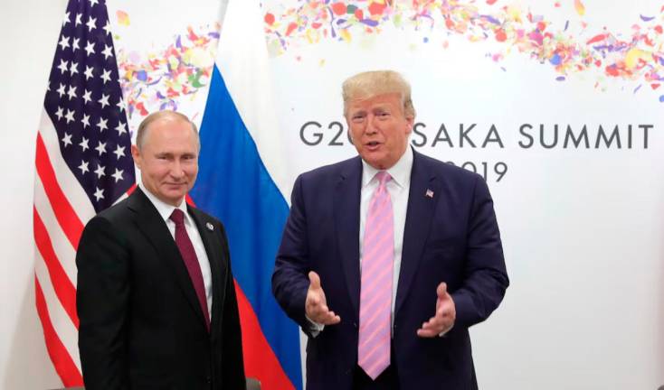 Russia’s President Vladimir Putin and U.S. President Donald Trump. -REUTERS