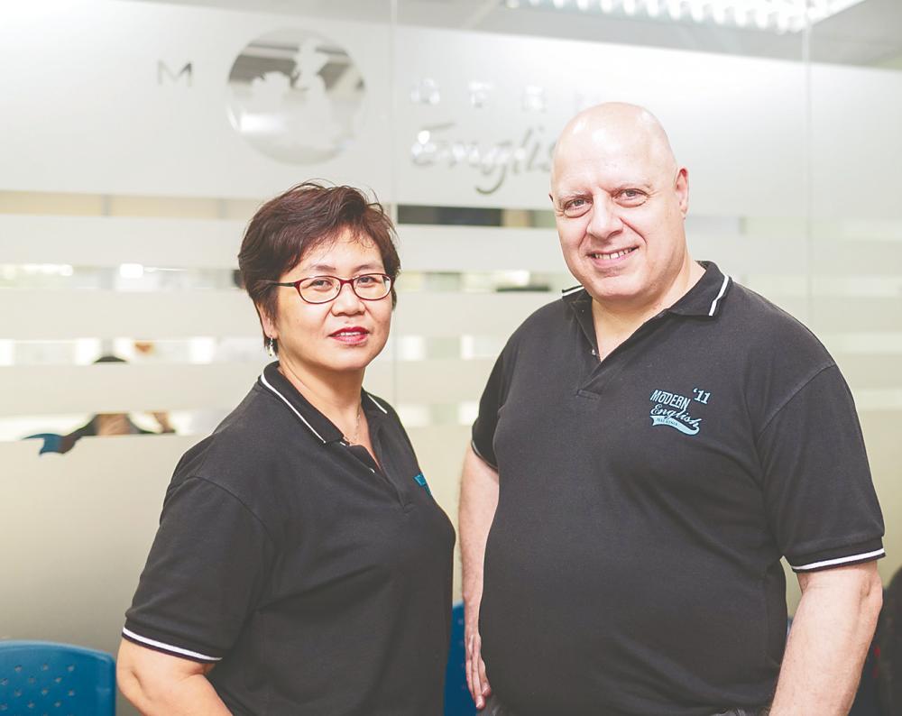Holloway (right) and Angie founded Modern English Puchong in 2011.