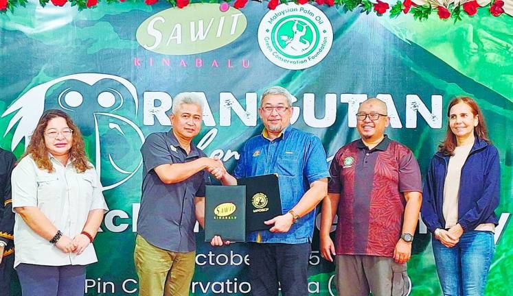 (From left) Mojilis, Ationg, Yusran, Hairulazim and Belvinder during the MoU signing ceremony.