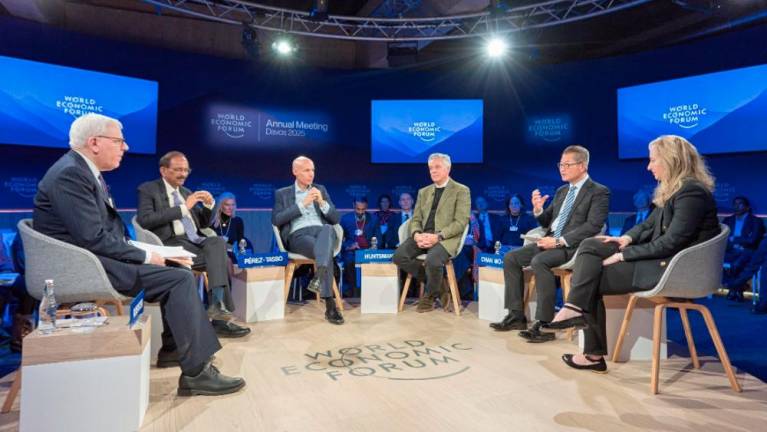 Hong Kong SAR’s Financial Secretary, Paul Chan (second right), participating in the session “Stemming Financial Fragmentation” of the WEF Annual Meeting.