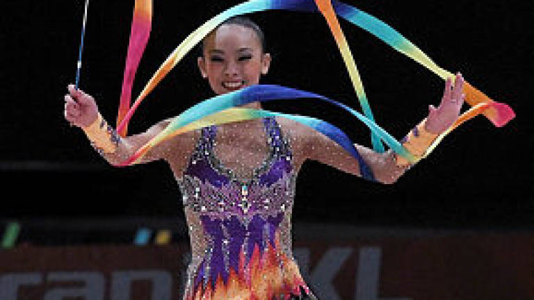Malaysian gymnasts dominate individual apparatus events, deliver 100th gold