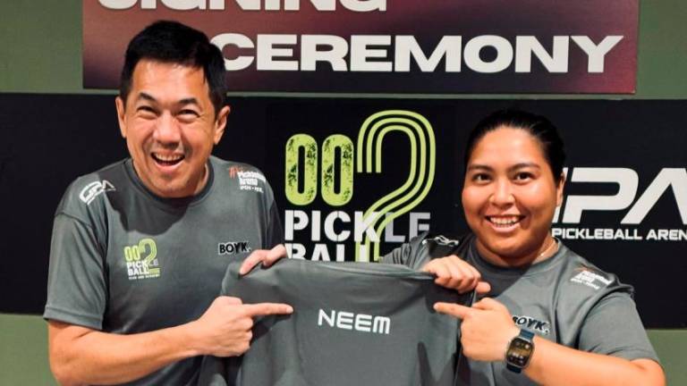 002 Pickleball Club &amp; Academy signs Malaysia’s No. 1 Women’s Doubles Neem Shamsuddin