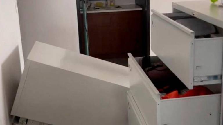 A cabinet lies on the floor following an earthquake of magnitude 7.5 that struck offshore in the southern Philippines, in Davao City, Mindanao, Philippines, October 10, 2025 in this screen grab obtained from a social media video. Francis Magbanua/via REUTERS