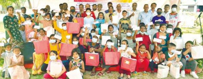 The children and families with their goody bags at the event. – PIX COURTESY OF PHA