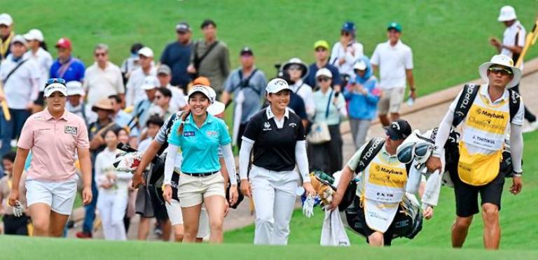 From left: Haeran Ryu, Jeeno Thitikul and Ruoning Yin at Maybank Championship 2024.