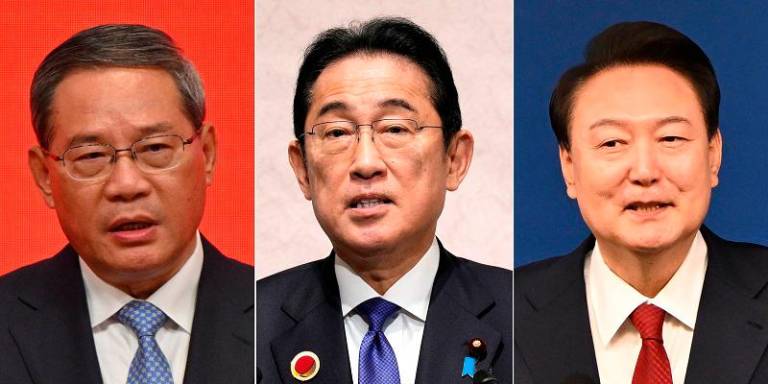 (L-R) China’s Premier Li Qiang, Japan’s Prime Minister Fumio Kishida, South Korea’s President Yoon Suk Yeol. - AFPPIX