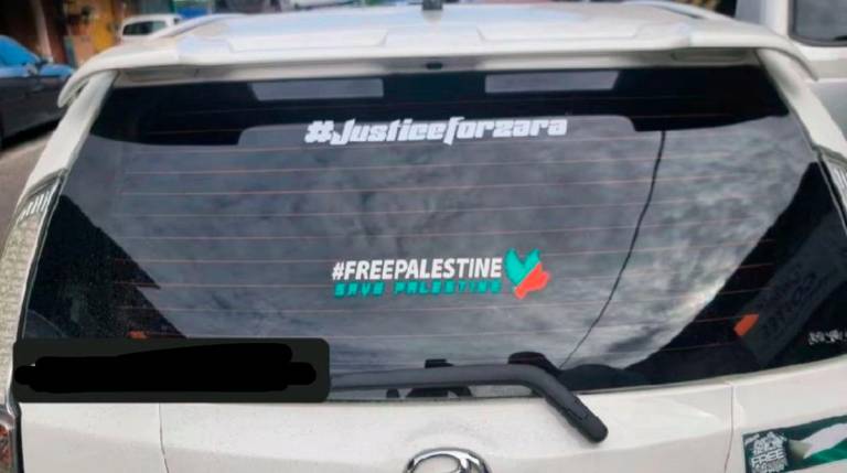 Screenshot of a JusticeforZara car sticker for sale via e-commerce platform.