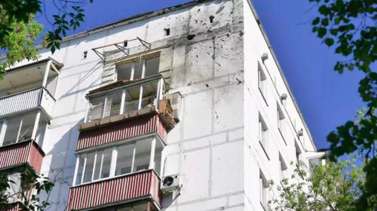 This photo shows an apartment building where the downed Ukrainian drone fell at in Moscow, Russia, Tuesday, May 6, 2025. - AFP