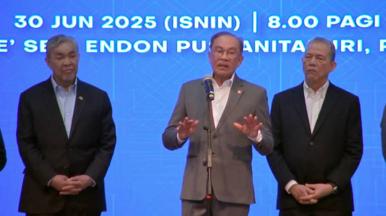 Prime Minister Datuk Seri Anwar Ibrahim during a gathering with staff from the Prime Minister’s Department today. (Credit - Anwar Ibrahim / Facebook)