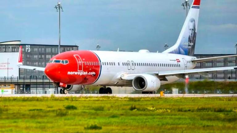 A passenger plane of the Norwegian airline Norwegian Air takes off at Berlin Brandenburg Airport Willy Brandt (BER). Photo: Patrick Pleul/dpa-Zentralbild/dpa