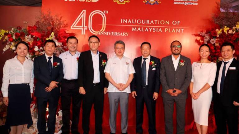 Deepening technological investments in Senai Airport City. Investment, Trade &amp; Industry deputy minister Liew Chin Tong (middle), standing with Investment, Trade, Consumer Affairs and Human Resources Committee Johor chairman Lee Ting Han, SHB CEO and Senai Airport City CEO Gan Seng Keong.
