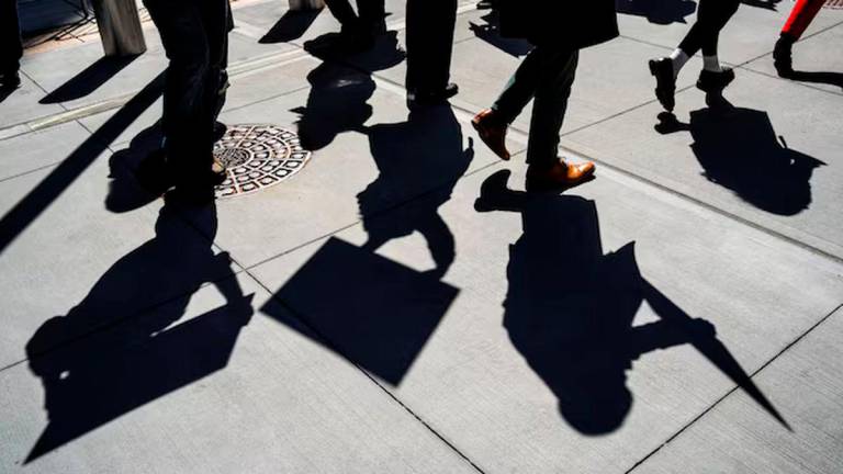 People attend a rally in support of federal workers outside the 26 Federal Plaza, a federal office building in New York City, U.S., March 25, 2025. REUTERS/Eduardo Munoz/File Photo
