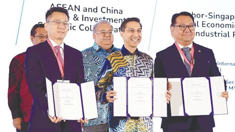 Front row, from left: Zhang, Fad’l Mohamed and Khairi Shahrin Arief. Back row, from left, are Sikh Shamsul Ibrahim and Mohammad Faiz.